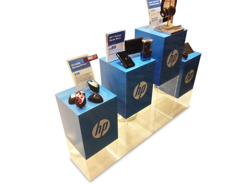 Graphics can be added to clear acrylic plinths to achieve attention-grabbing effects