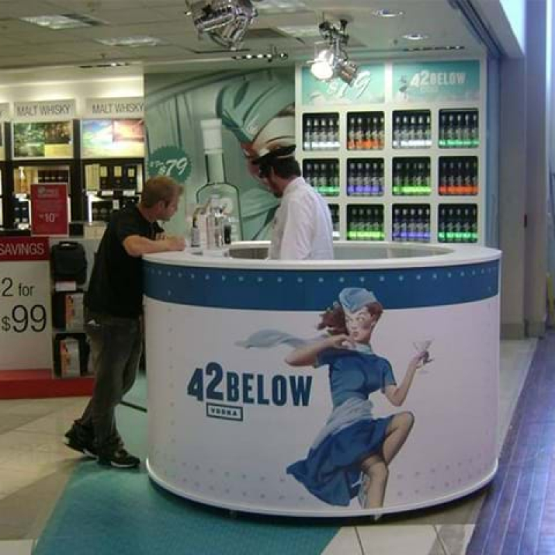 42 below kiosk train carried bottles around the circumference - Displays2Go.com.au