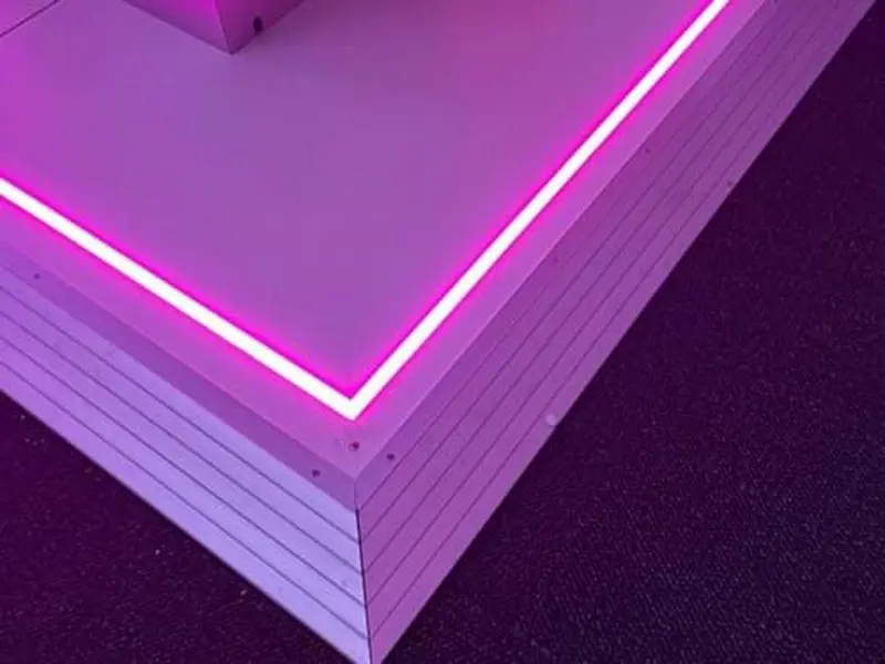 Perimeter lighting added to a raised floor